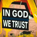 a sign that says in god we trust